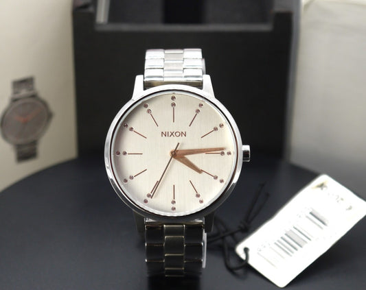 Montre femme Nixon Kensington argentée, or clair et cristal A099 1519