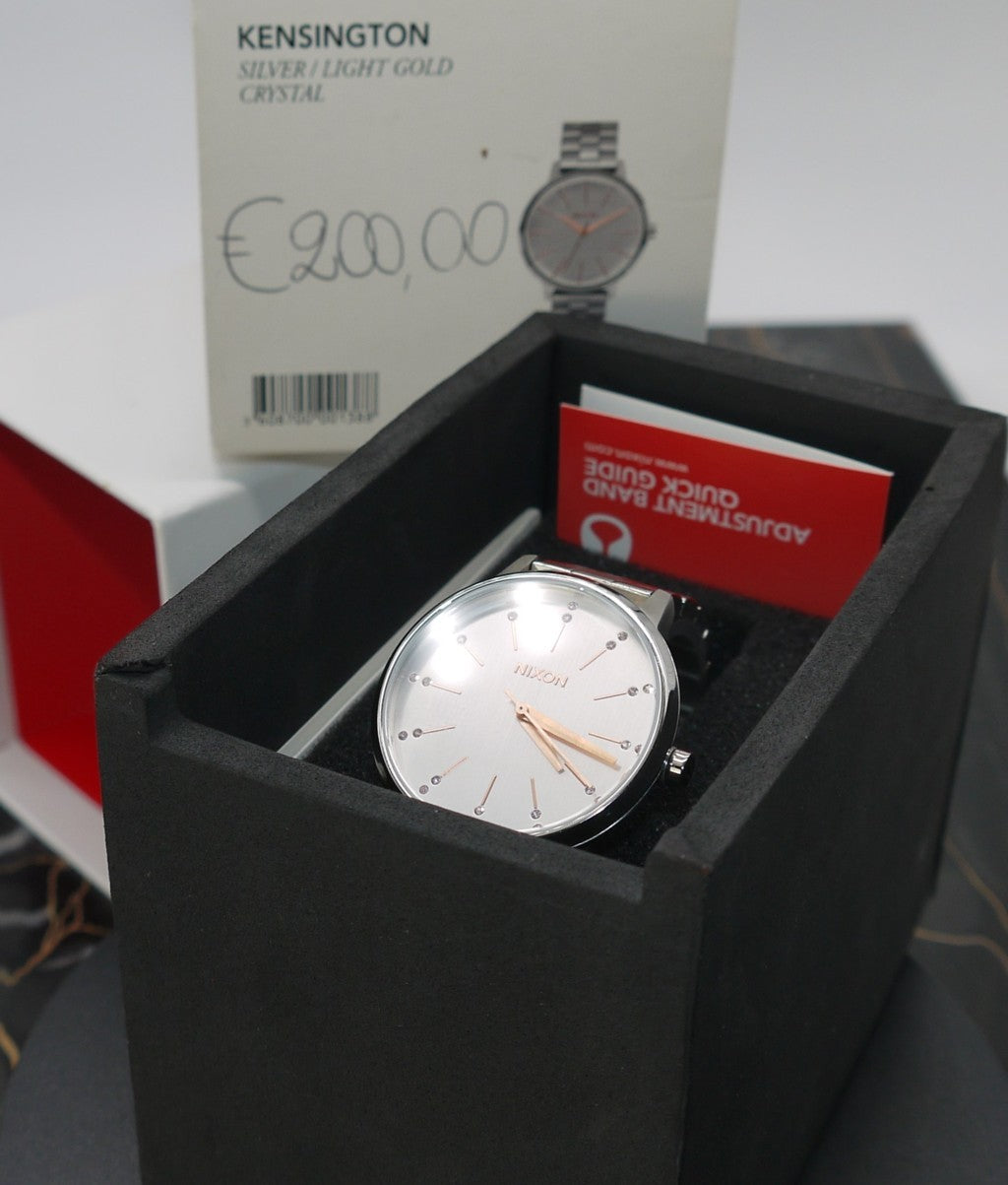 Montre femme Nixon Kensington argentée, or clair et cristal A099 1519