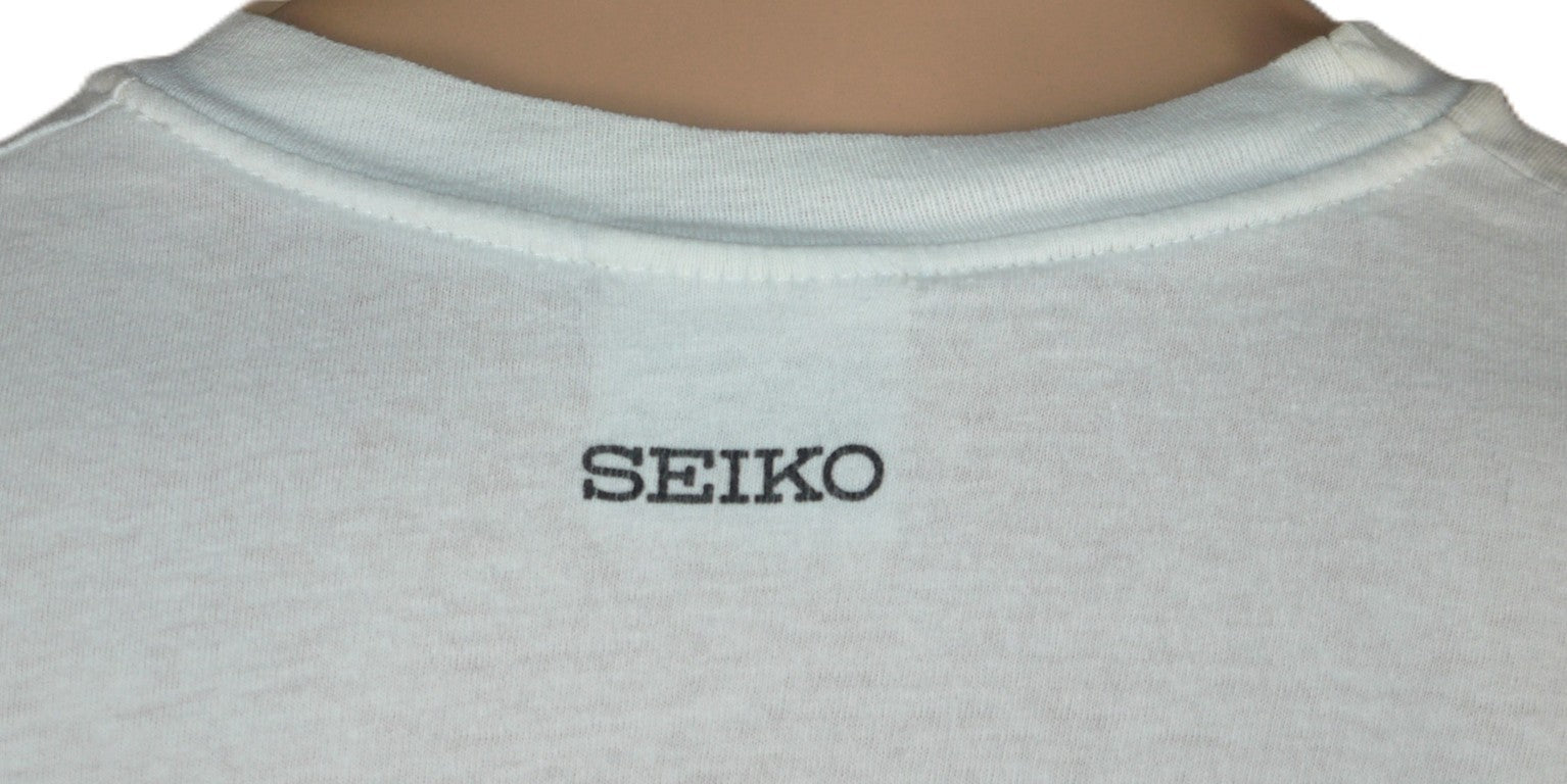 T-Shirt John Lennon Self Portrait & Yoko Ono – Bag One Arts Inc. © 1989 – Seiko Edition dettaglio logo posteriore seiko