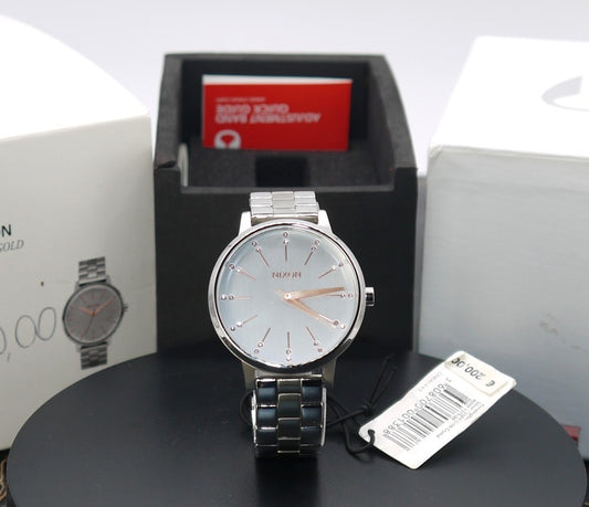 Montre femme Nixon Kensington argentée, or clair et cristal A099 1519