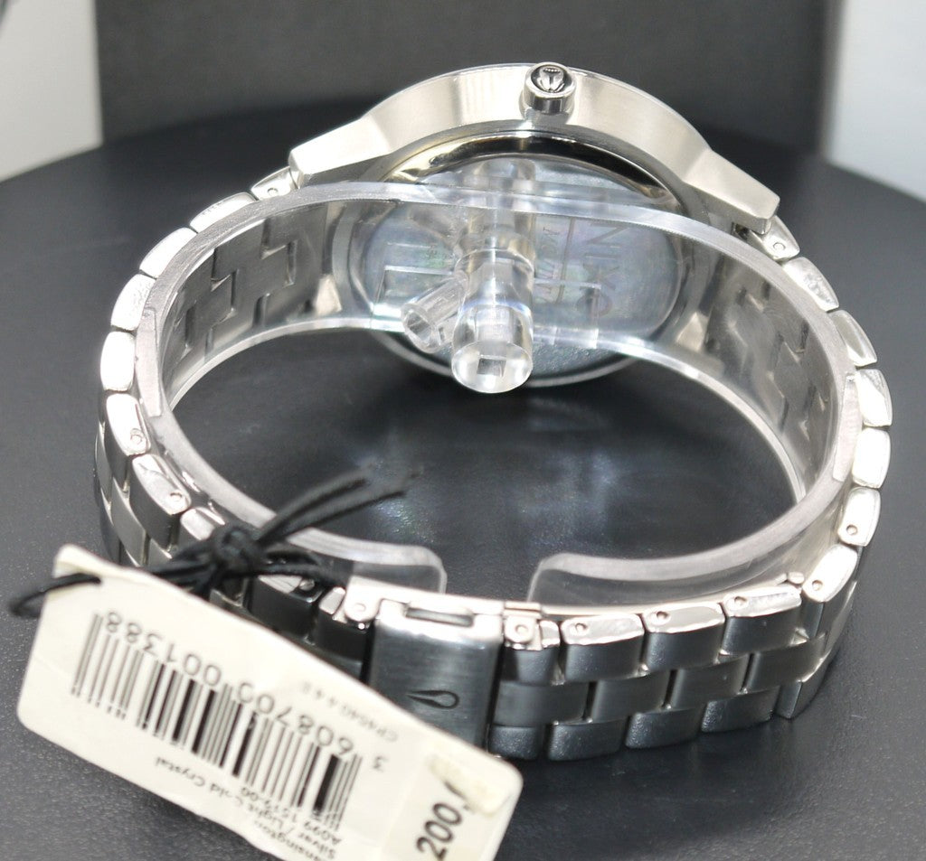 Montre femme Nixon Kensington argentée, or clair et cristal A099 1519